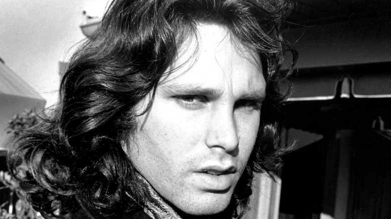 Jim Morrison looking at the camera suspiciously