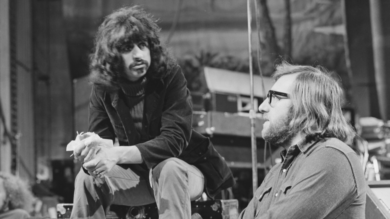 Ringo Starr talking with Mal Evans