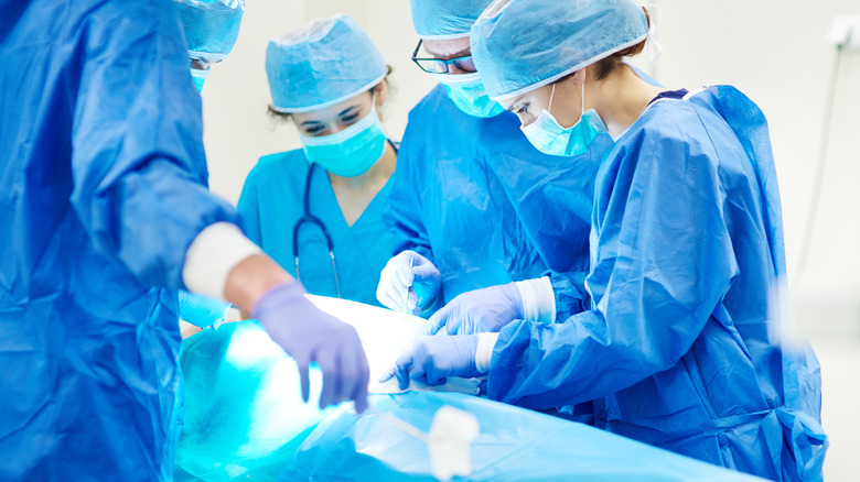 Doctors doing surgery