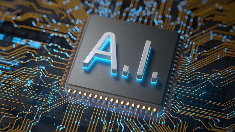 The letters AI embedded in a computer chip attached to a motherboard