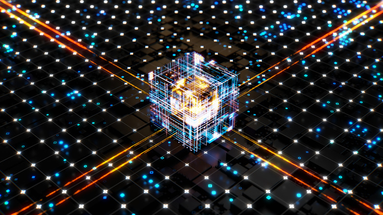 A stylized cube-shaped processor among many points of light