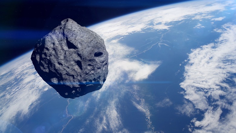 An asteroid floating in space near the Earth