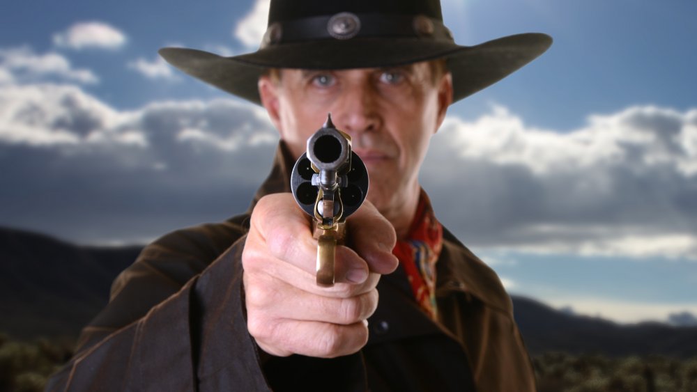 Cowboy pointing gun