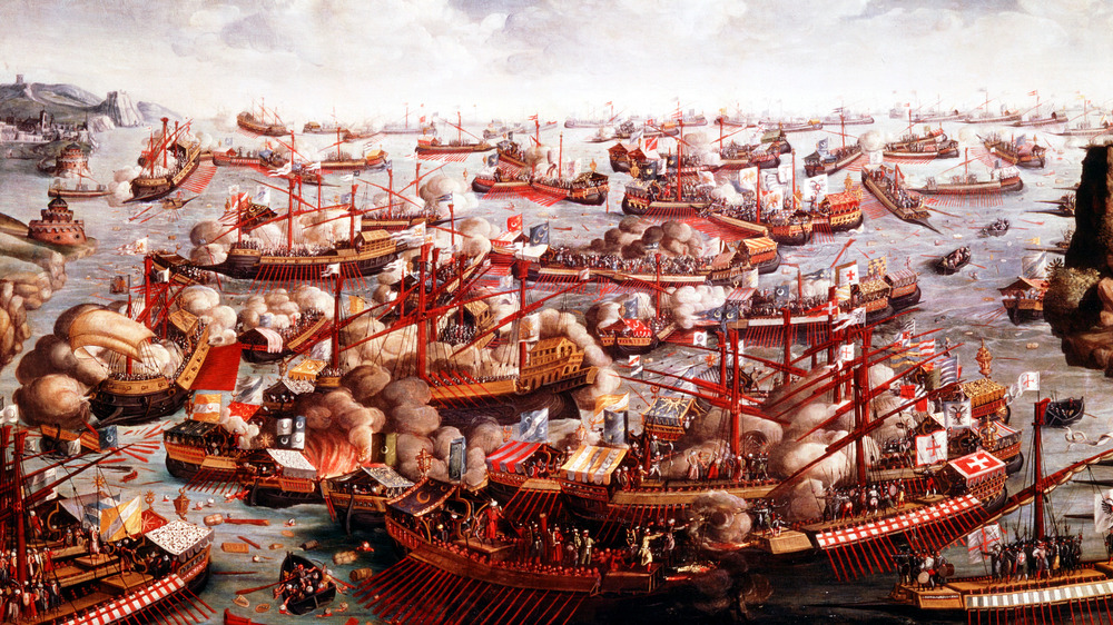 painting of the battle of lepanto with ships in harbor