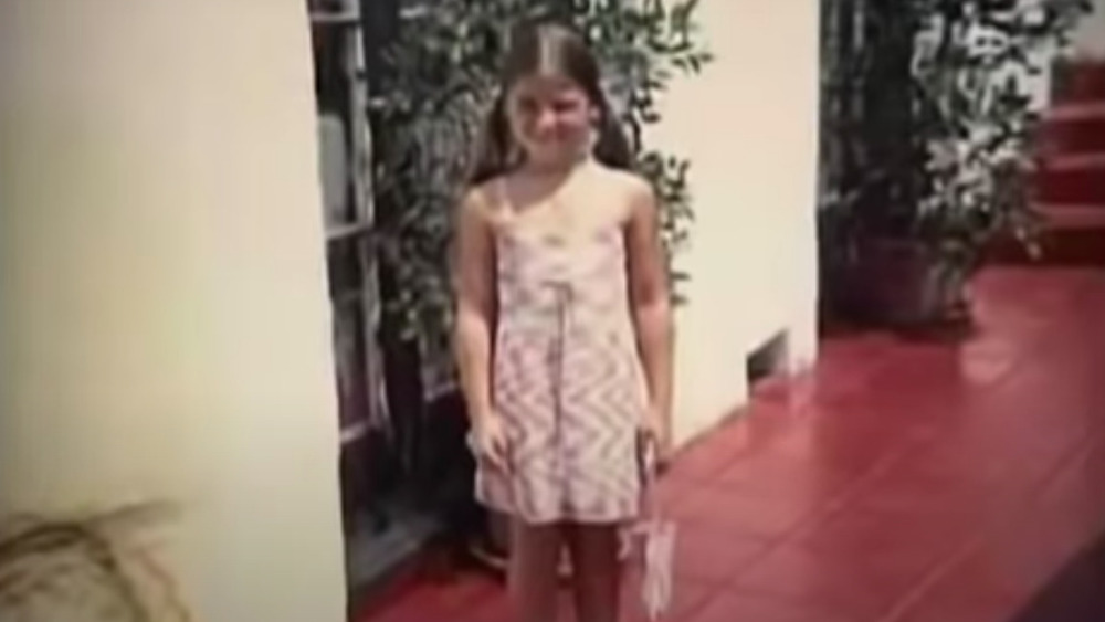 Tali Shapiro wearing pigtails and pink dress