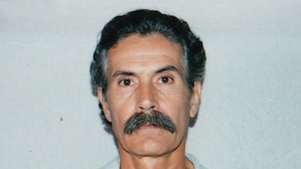 Rodney Alcala with short hair and mustache
