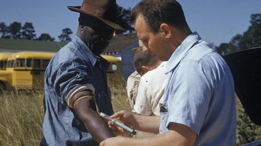 doctor injecting Tuskegee patient