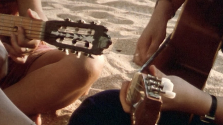 guitar beach hands