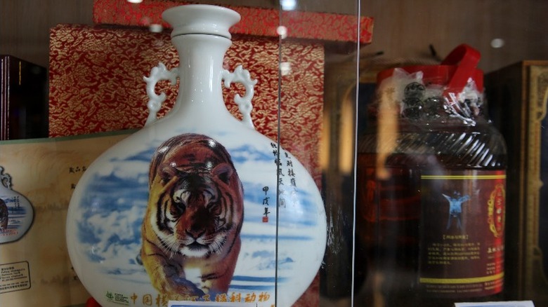 A bottle of tiger bone wine for sale at a shop in China