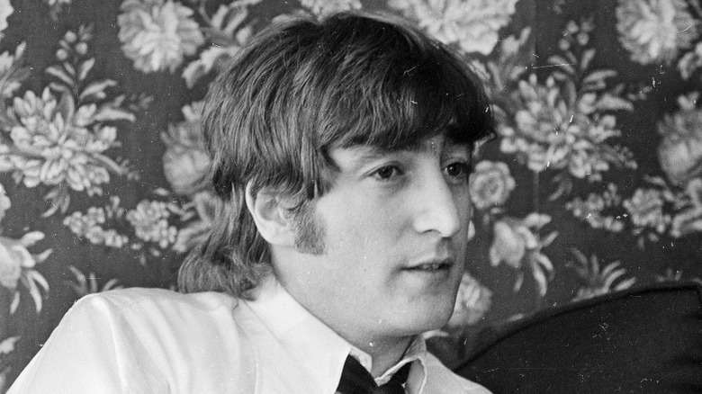 John Lennon looking troubled