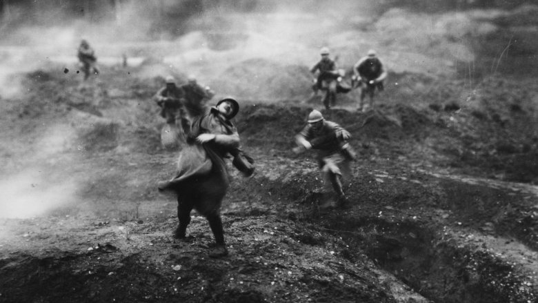 soldiers running and surrounded by mustard gas