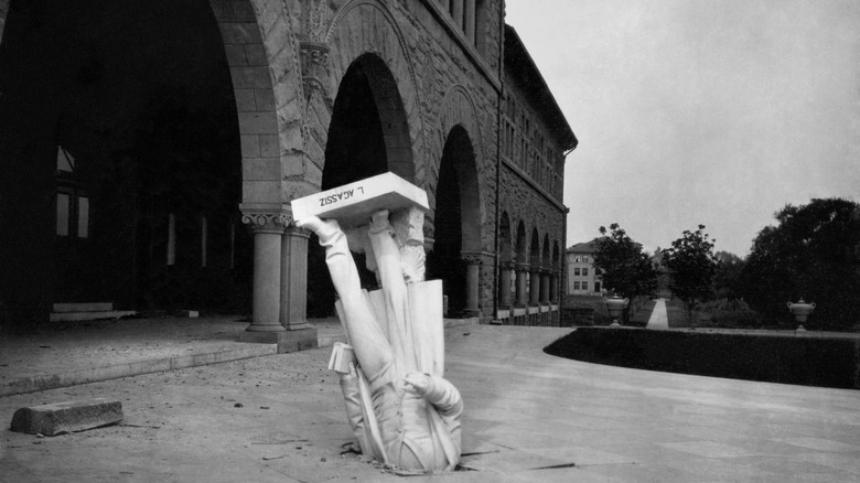 Statue broken though sidewalk after 1906 San Francisco Earthquake