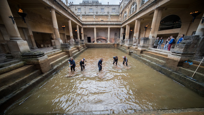 Roman bath being cleaned