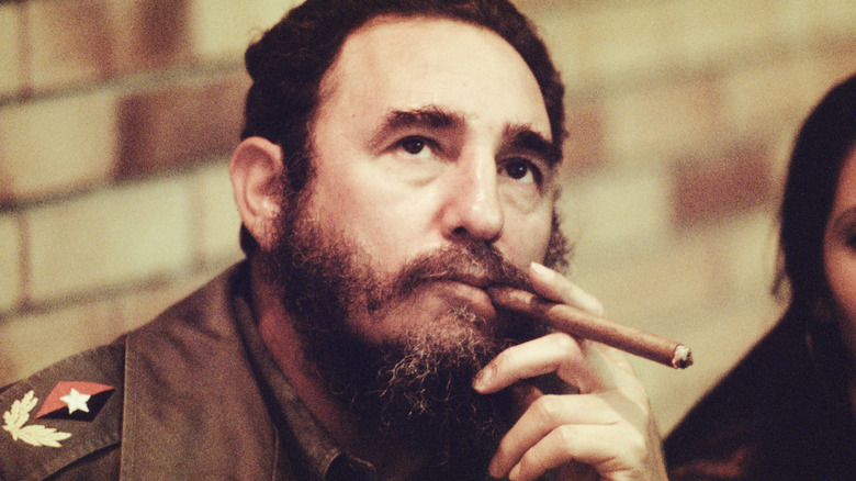Fidel Castro looking up smoking cigar