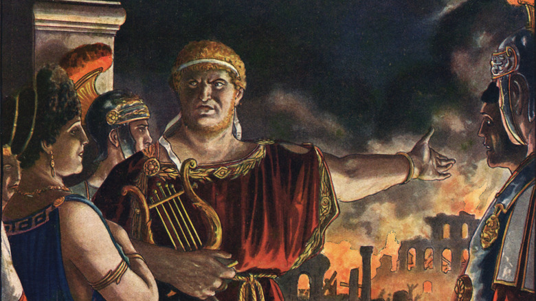 Nero holding hand towards burning buildings