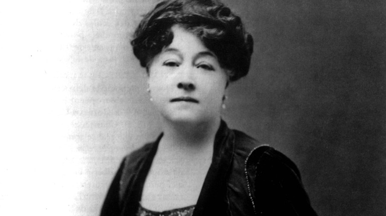Alice Guy-Blaché poses for a black and white photo portrait