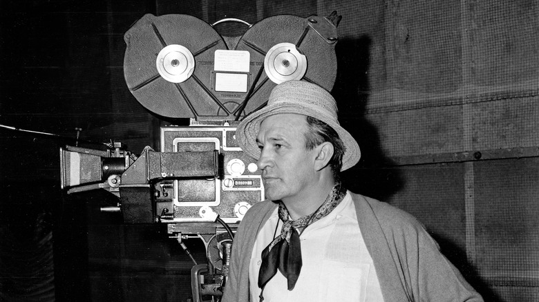 Wilhelm Dieterle standing in front of a film camera