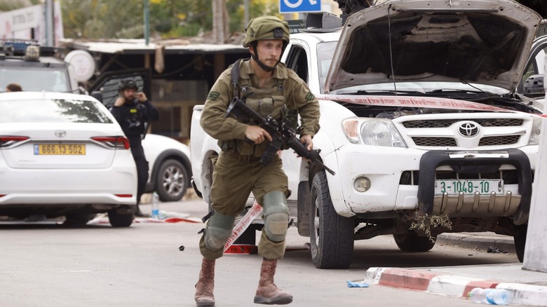IDF soldier running in street