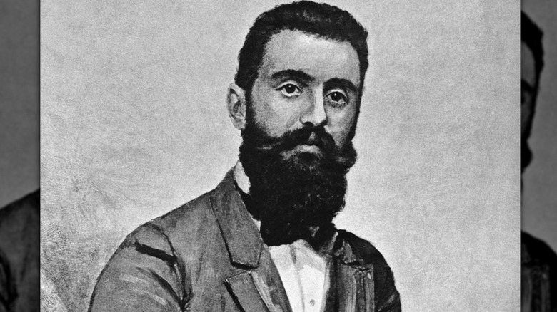 Theodor Herzl sitting at desk