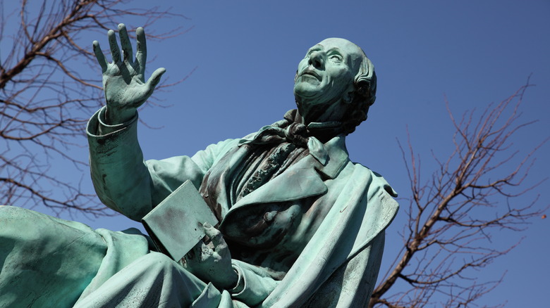 Hans Christian Andersen statue hand raised