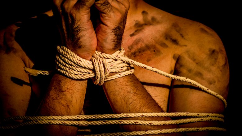man tied up