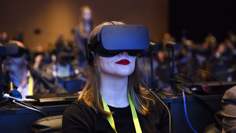 Woman wearing an Oculus Rift headset