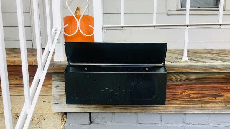 Exterior mailbox attached to porch