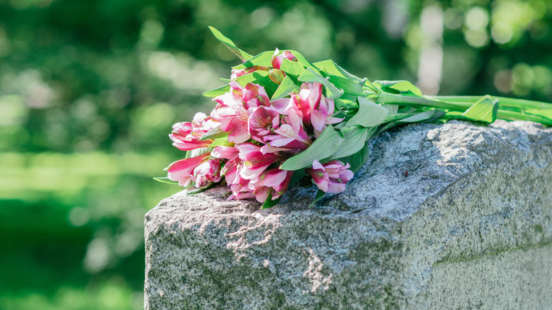 pink flowers on headstone