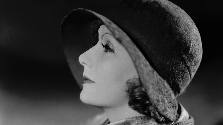 Greta Garbo in hat in profile