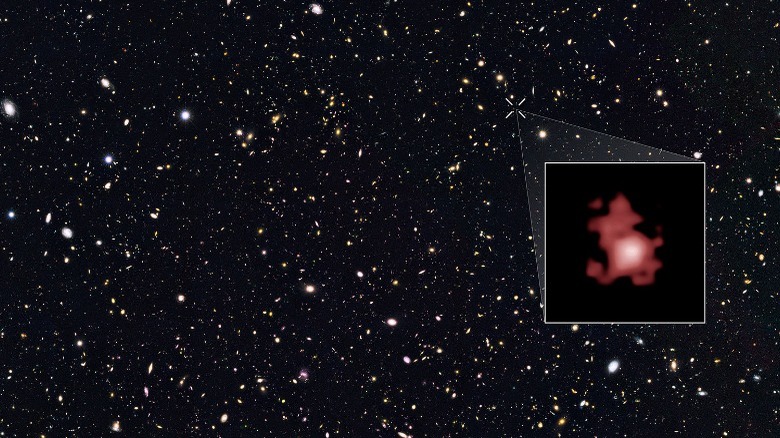distant galaxy superimposed from hubble telescope