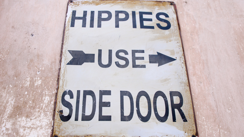 Hippies Use Side Door sign