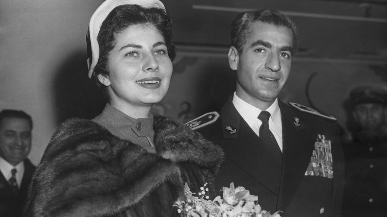 Shah Pahlavi with his wife, Queen Soraya, smiling