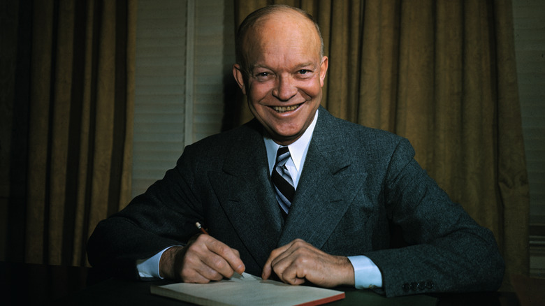 Eisenhower desk smiling