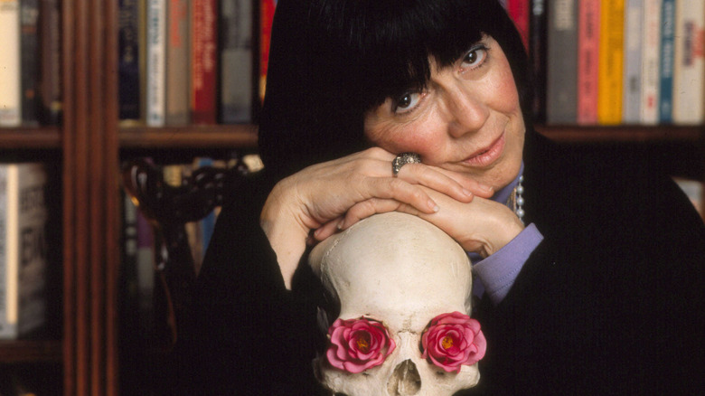 Anne Rice poses with a skull