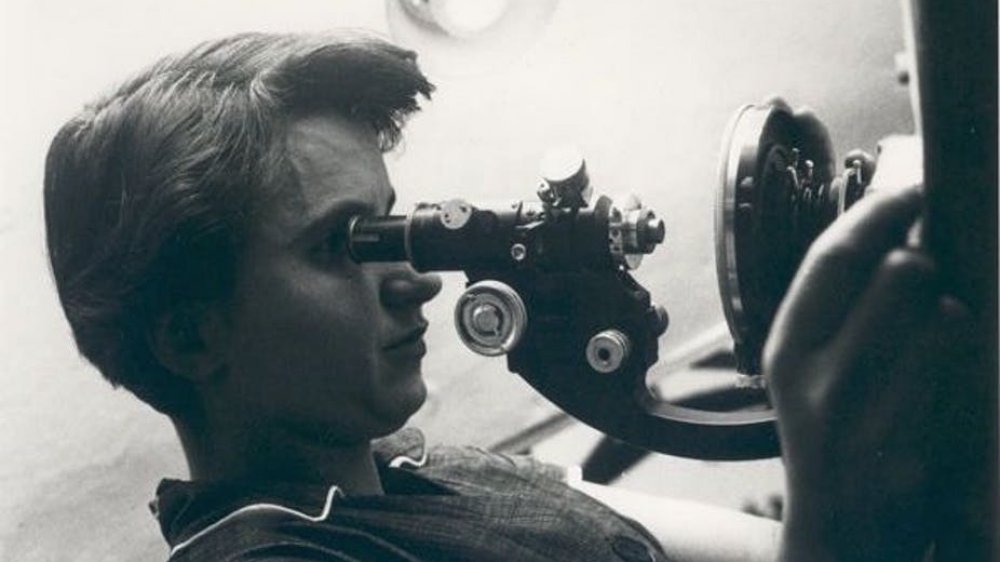 Rosalind Franklin at a microscope