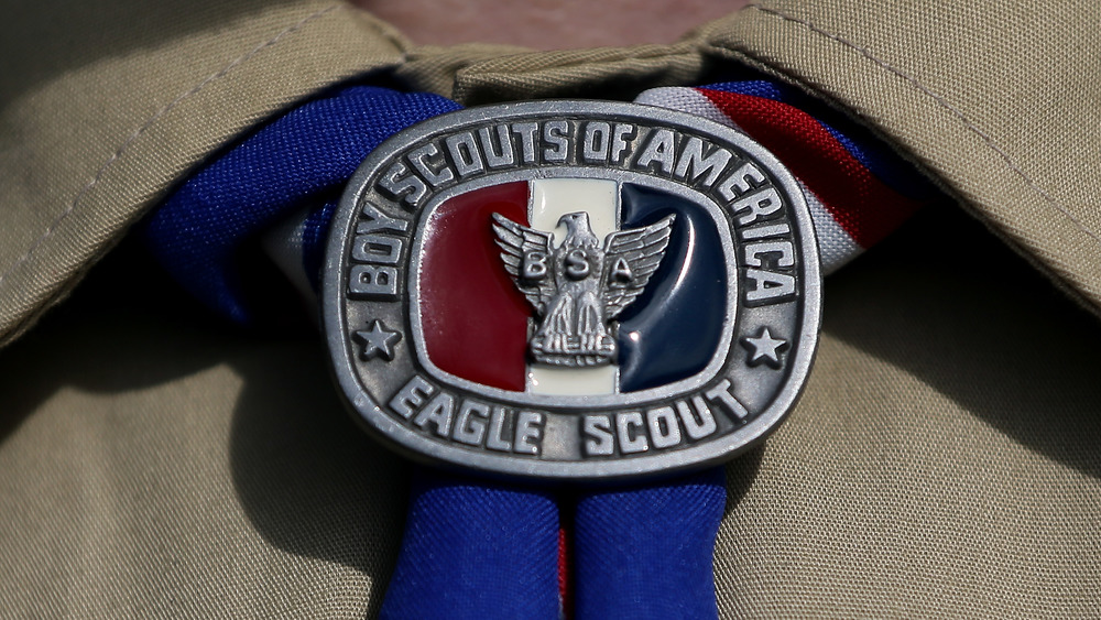 Boy Scout wearing Eagle Scout kerchief slide