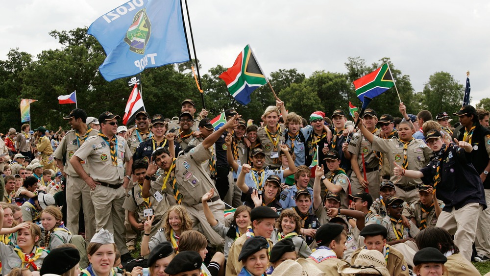 Boy Scouts holding flags at World Jamboree in 2007