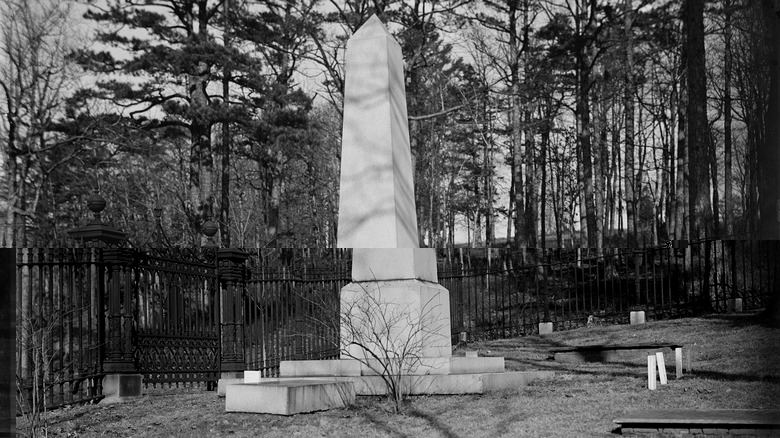 Thomas Jefferson's grave stands before woods