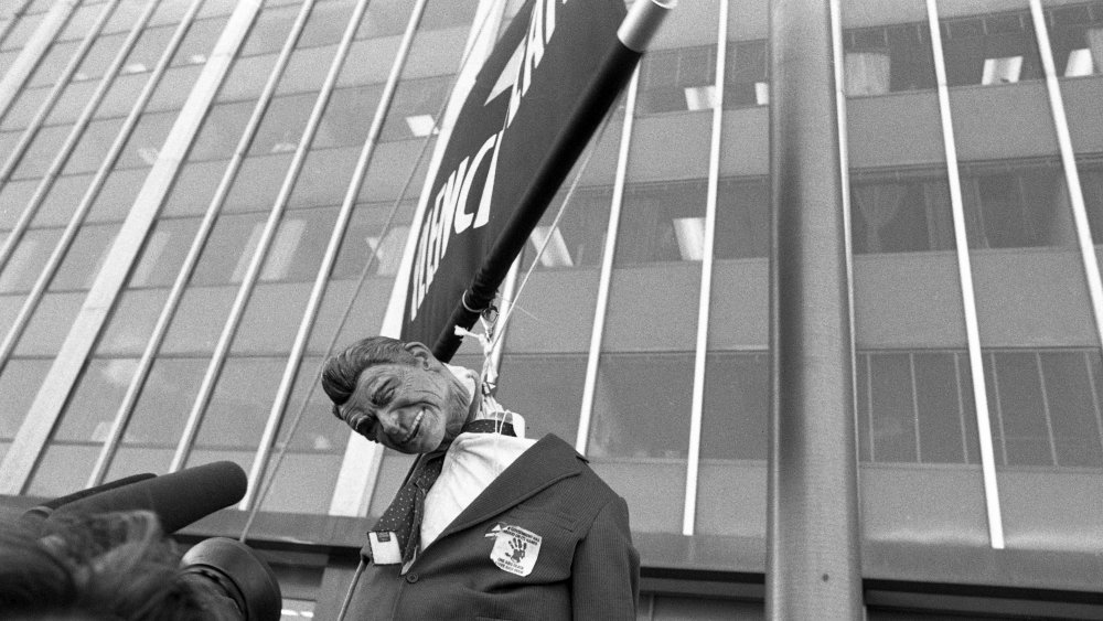 AIDS activist group ACT UP (AIDS Coalition to Unleash Power) protest at the headquarters of the Food and Drug Administration (FDA) with a puppet of Ronald Reagan