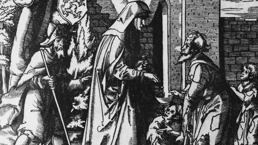 Saint Iduberge giving alms to a leper