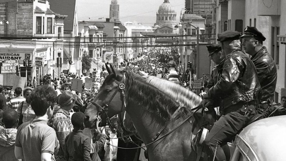Mounted policemen watch a Vietnam War protest march in San Francisco, April 15, 1967