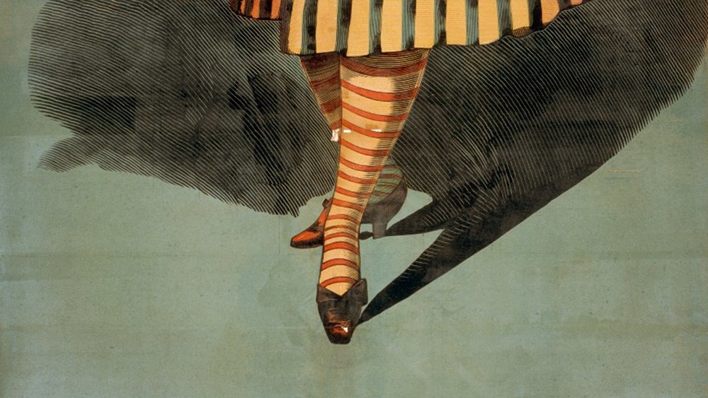 Victorian chorus girl in striped skirt and striped socks, 1880