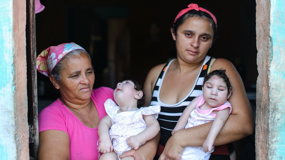 A Brazilian mother with her babies who developed microcephaly as a result of Zika.