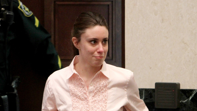 Casey Anthony in a pink shirt