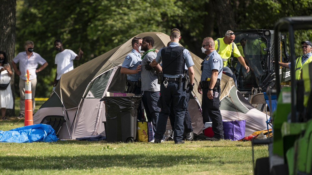 Man named "Squad" arrested for living in tent