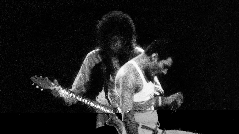 Freddie Mercury and Brian May performing