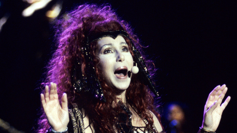 Cher performing in the '90s