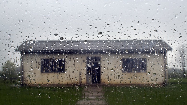 Bosnian concentration camp raining outside