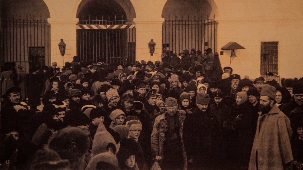 Reproduction of prisoners, including families, being processed in a Siberia camp in the late Tsarist period.