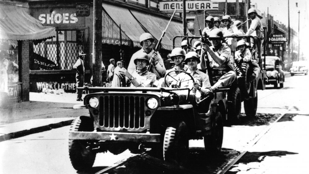 June 1943, Federal troops patrol the streets of Detroit in a jeep after 29 people were killed